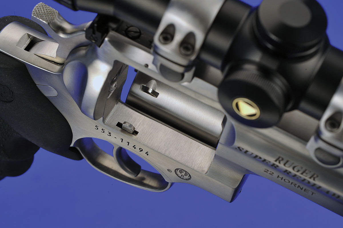 The locking bolt has been moved over to the right-hand side of the frame with the locking notches placed just off center of the charge holes. Ruger rings are standard on the gun and fit into machined notches on the top frame.